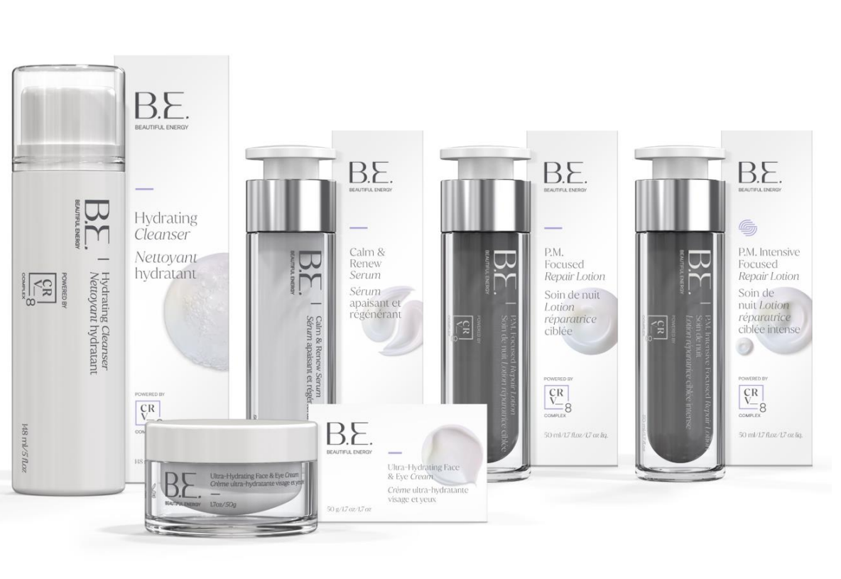 A group of bottles and boxes of be cosmetics on a white background.