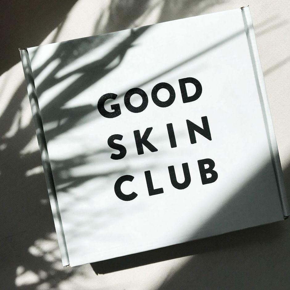 A white box with the words good skin club on it