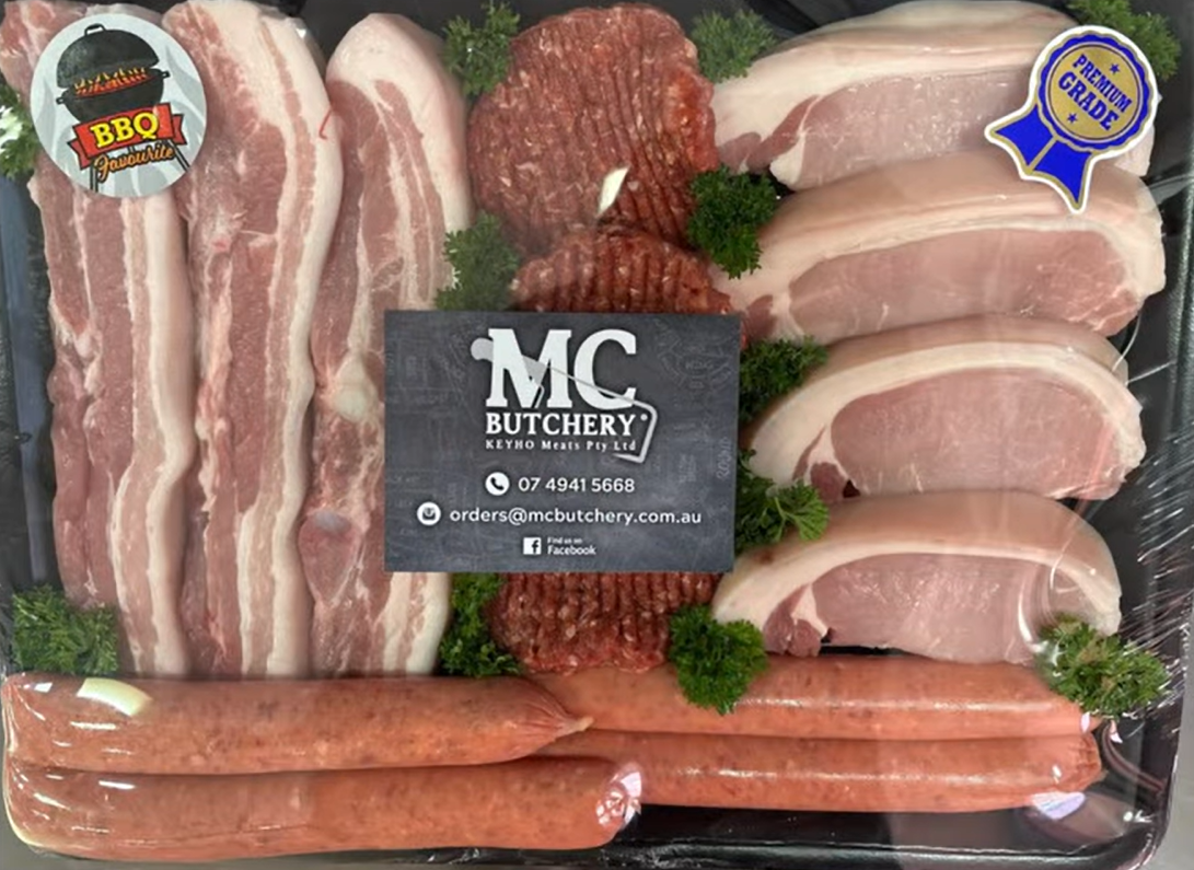 A plastic container filled with meat and sausages — MC Butchery in Moranbah, QLD