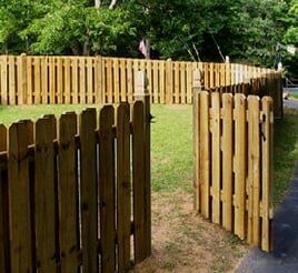 Stained Picket Fence and Gate - wood fence in Dr, Aurora, CO