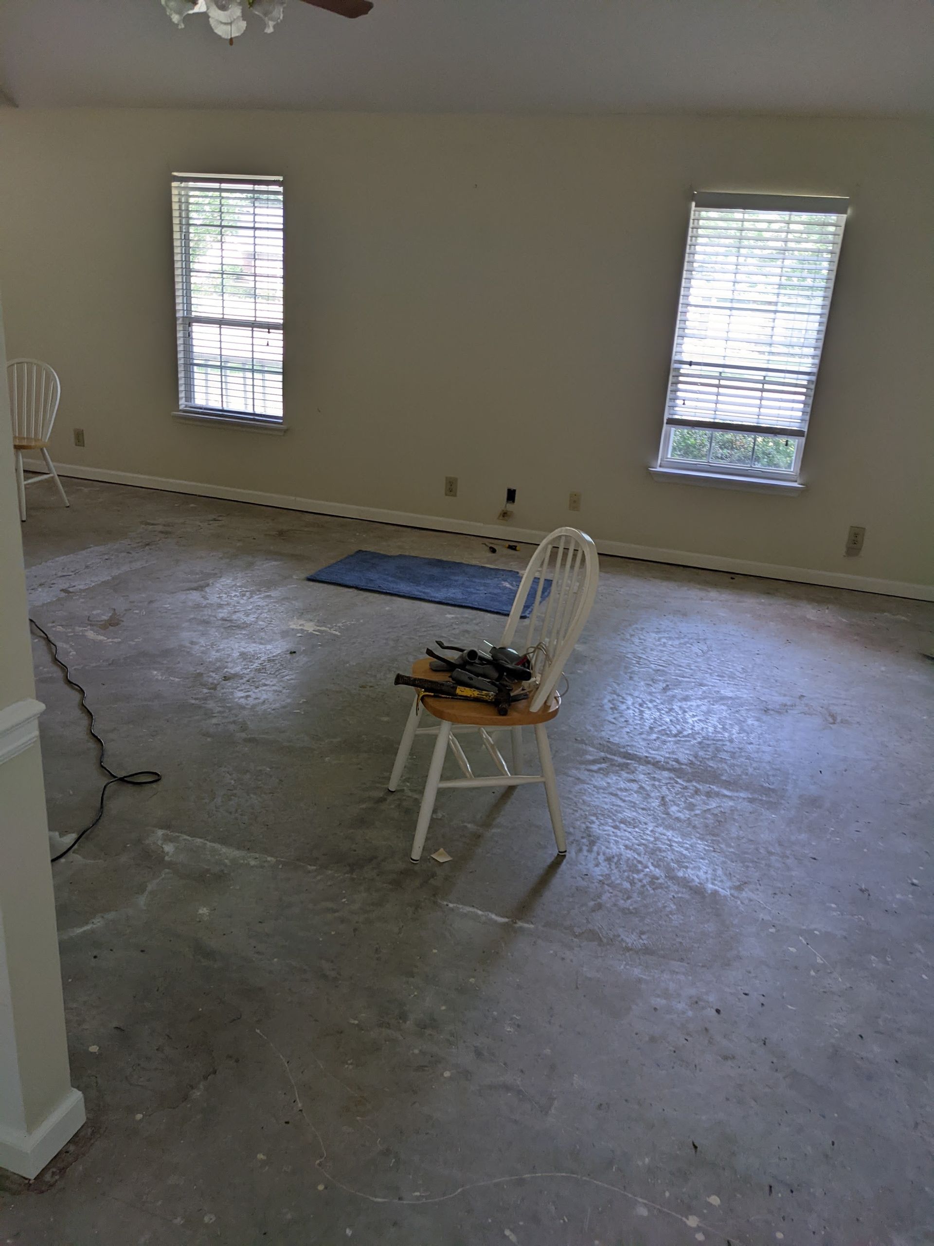 There is a chair in the middle of the room.