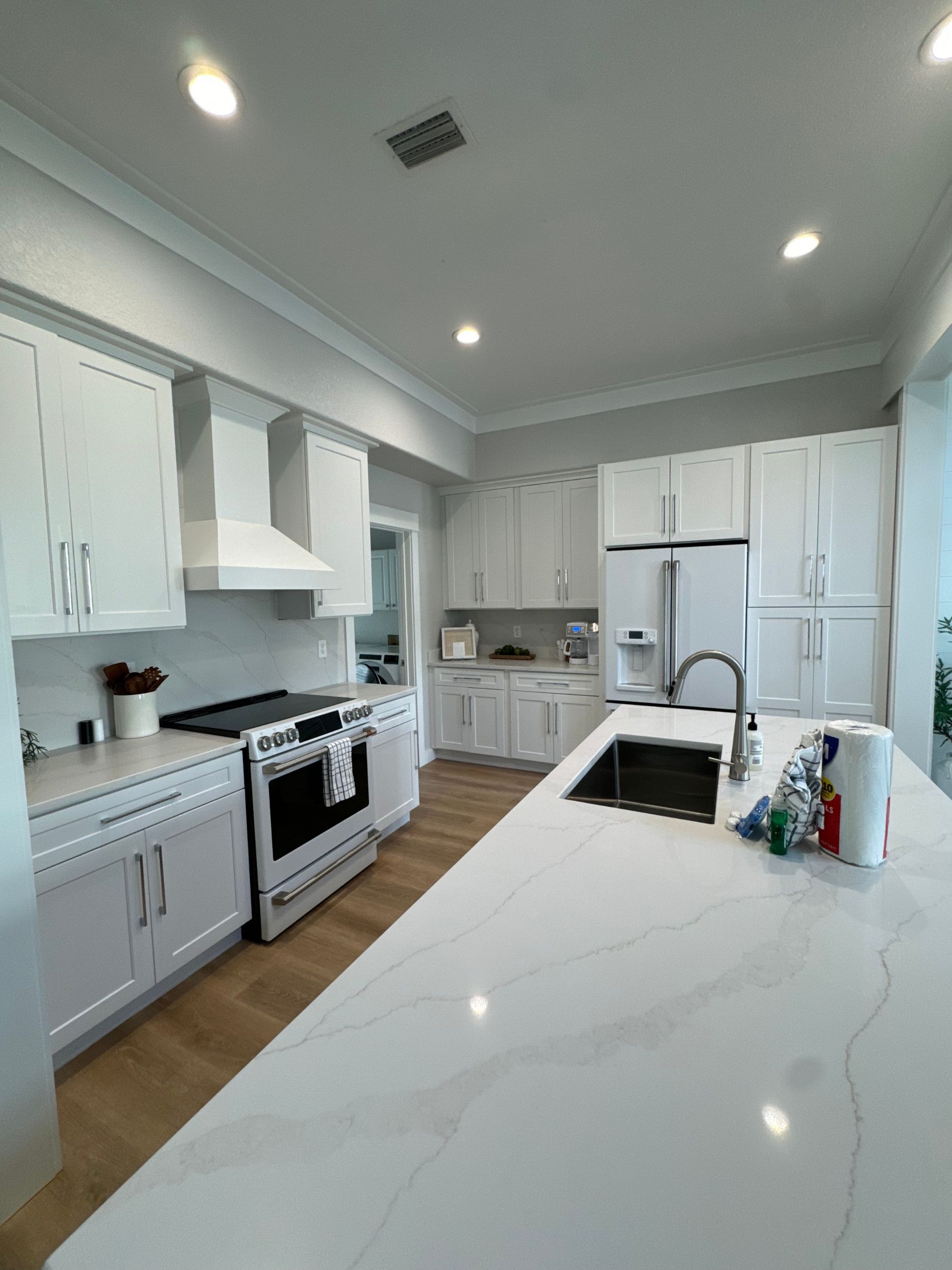 A living room filled with furniture and a flat screen tv.