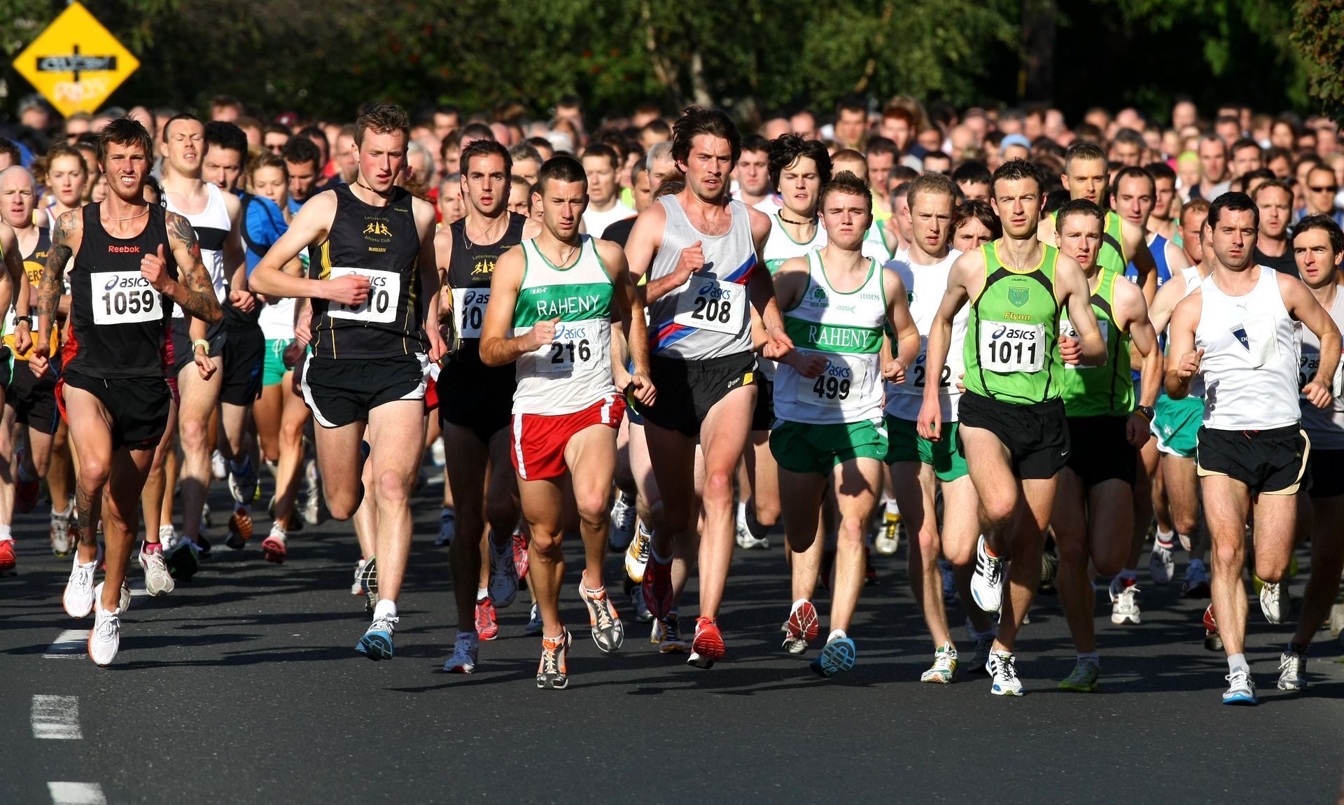 A group of people are running a marathon and one of them has the number 1011 on their shirt