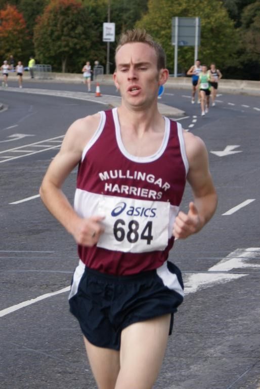 A runner with the number 684 on his shirt
