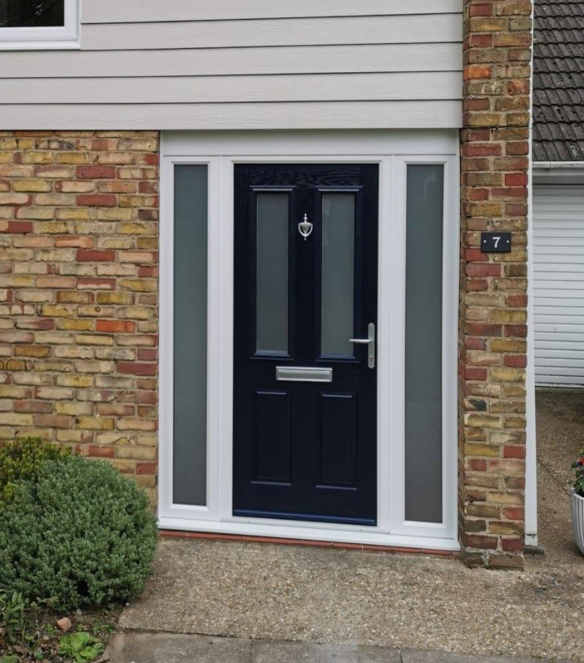 Black Composite Entry Door Flanked with Windows