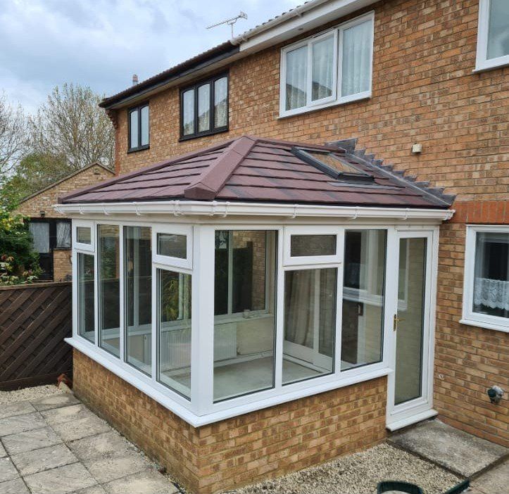 Edwardian conservatory installation on a brick house