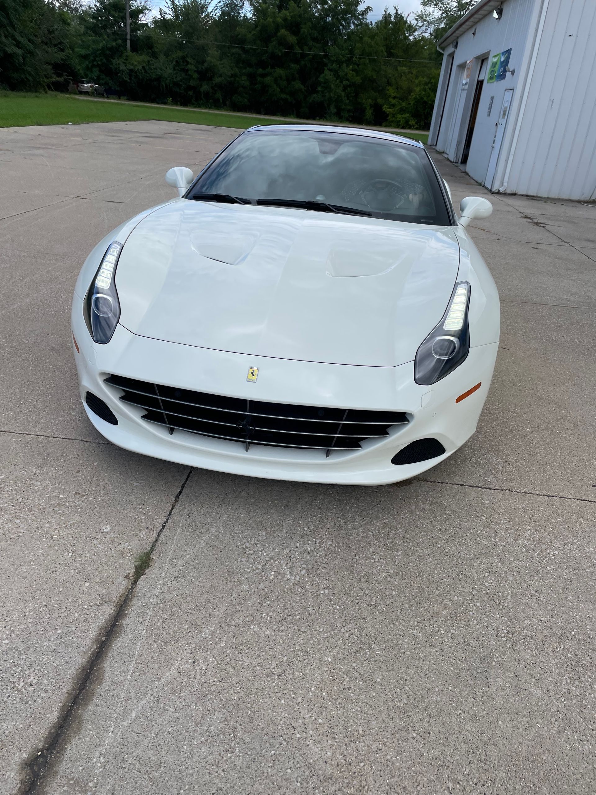 White car - Burton, MI - Dort Highway Auto Service