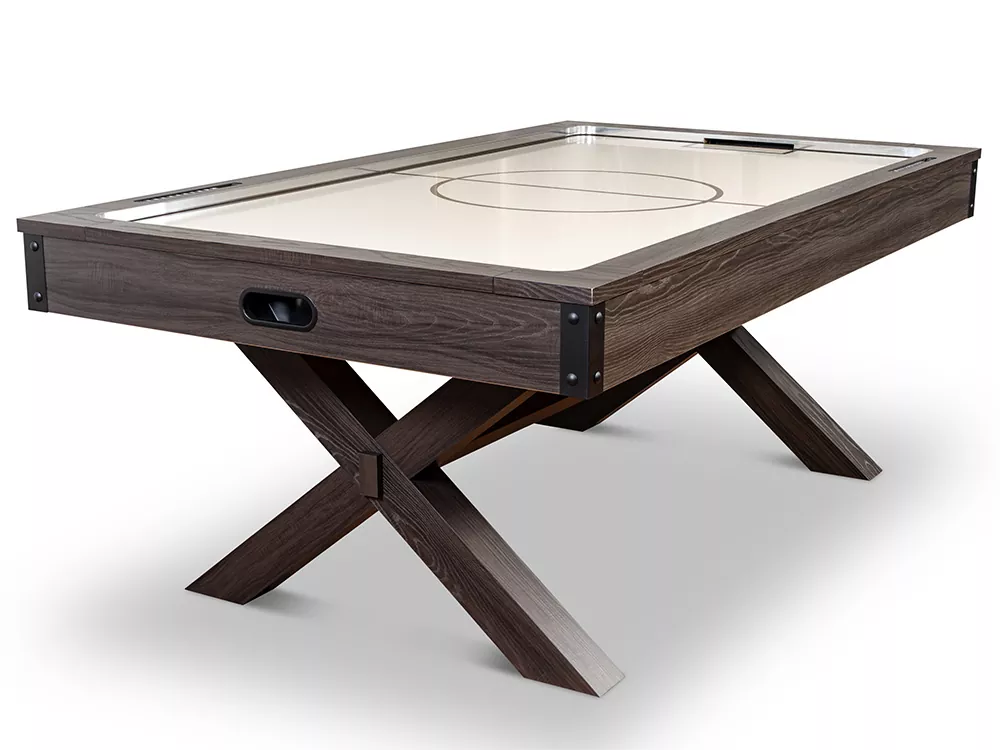 Wooden air hockey table with dark brown frame and legs, and a light-colored playing surface.