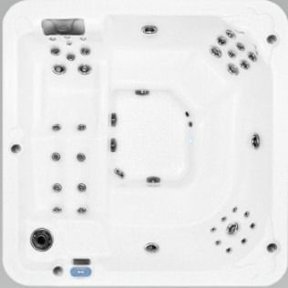 Top-down view of a white, square hot tub with multiple jets and seating areas.