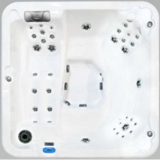 Overhead view of a white hot tub with various jet placements, and seating.
