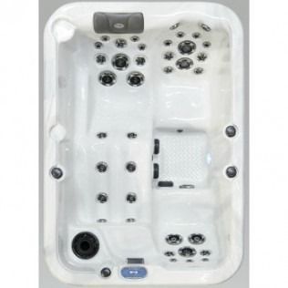 White hot tub with multiple jet nozzles and two contoured seating areas.
