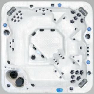 Overhead view of a white, square hot tub with black and blue jets and seating areas.