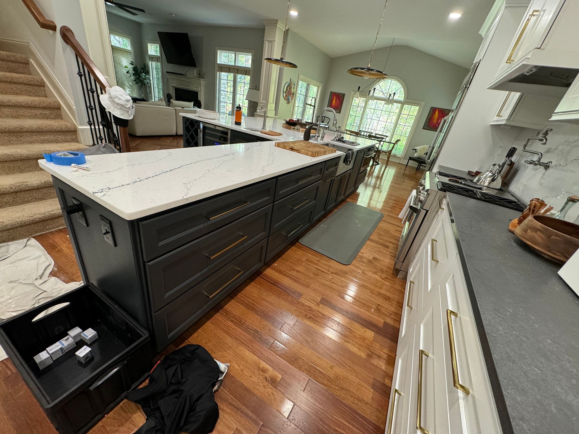 A kitchen with a large island in the middle of the room.