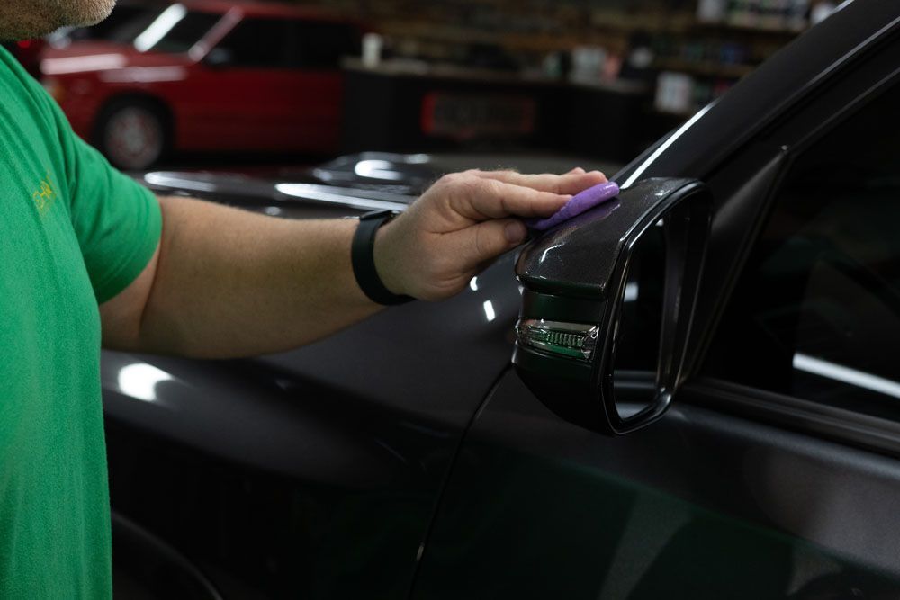 Exterior Detailing - Wiping the Side Mirror In Vista, CA