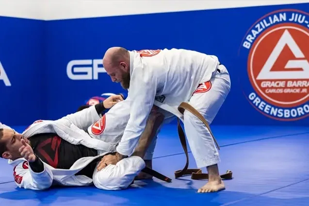 two male students practicing Jiu Jitsu at Gracie Barra Greensboro