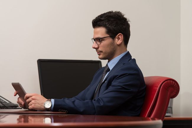 man looking at his phone