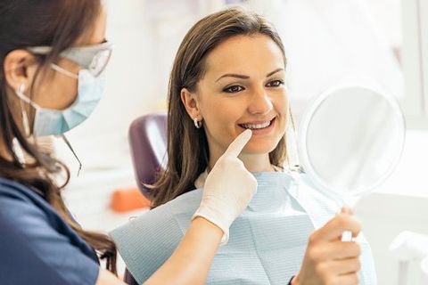 Dentists with a patient - Dental Services in Hesperia, CA