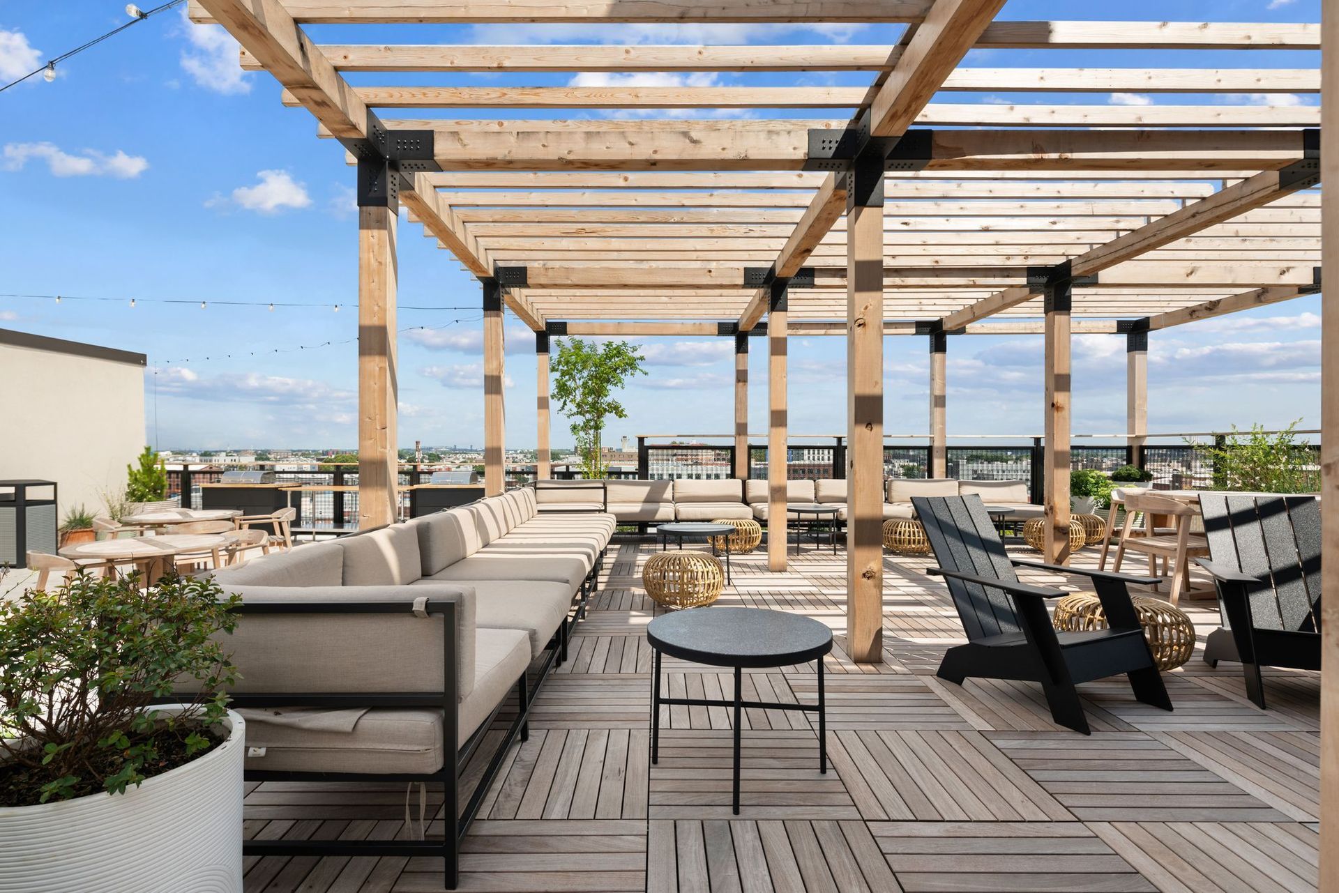 Photo of a rooftop deck with plenty of seating