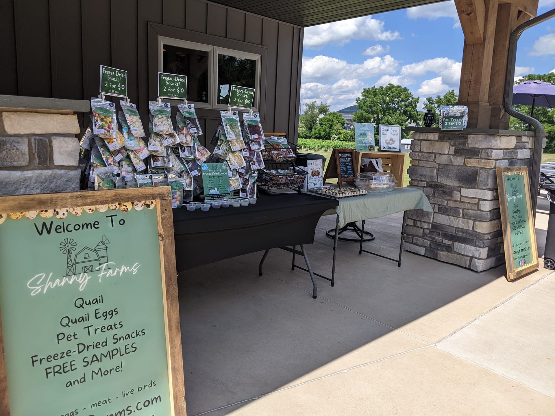 A table with a sign that says welcome to sherry farms on it.