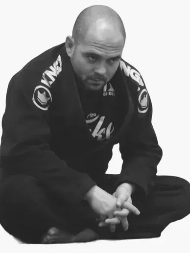 Two young boys wearing black karate uniforms with lcct bjj written on them