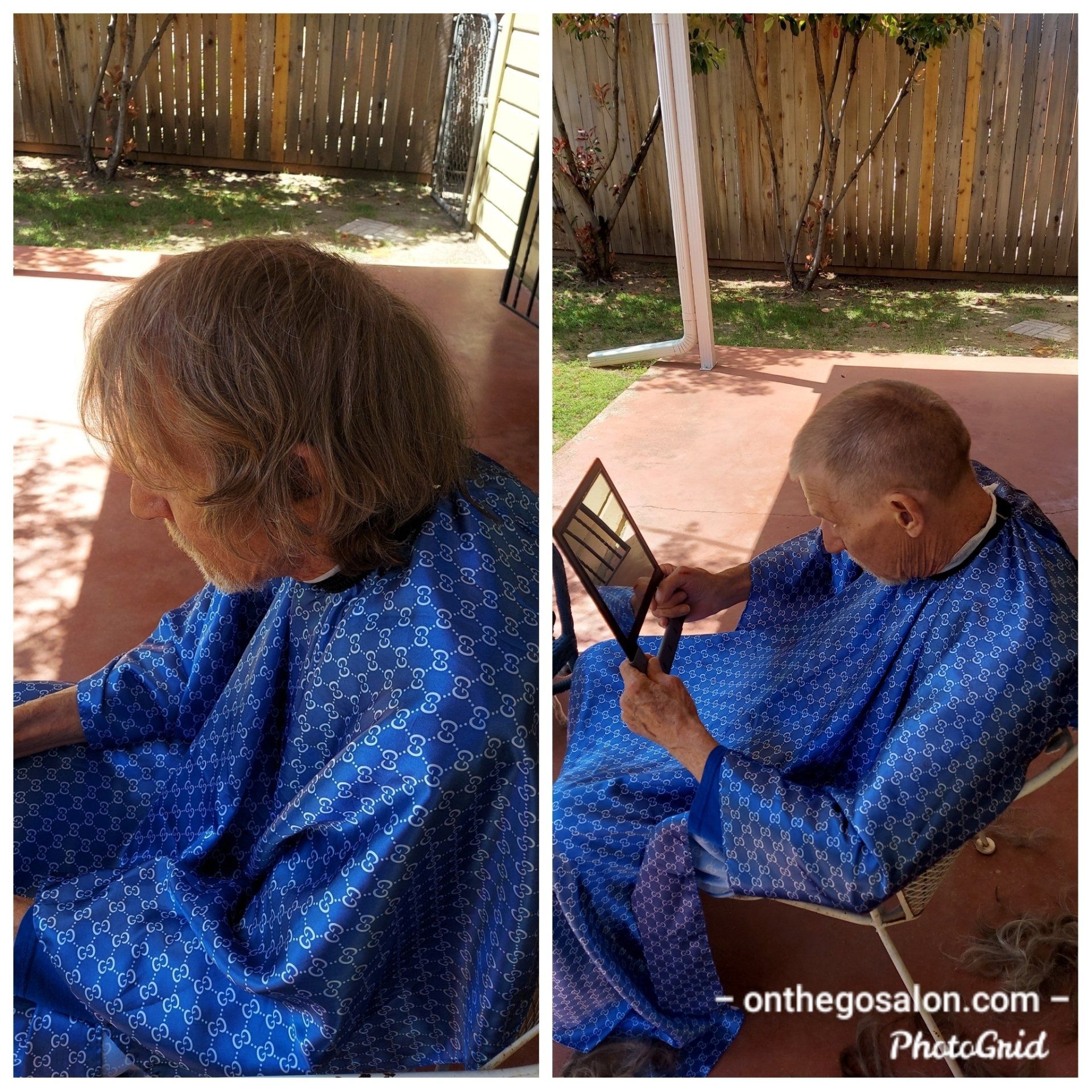 A man in a blue cape is looking at his hair in a mirror