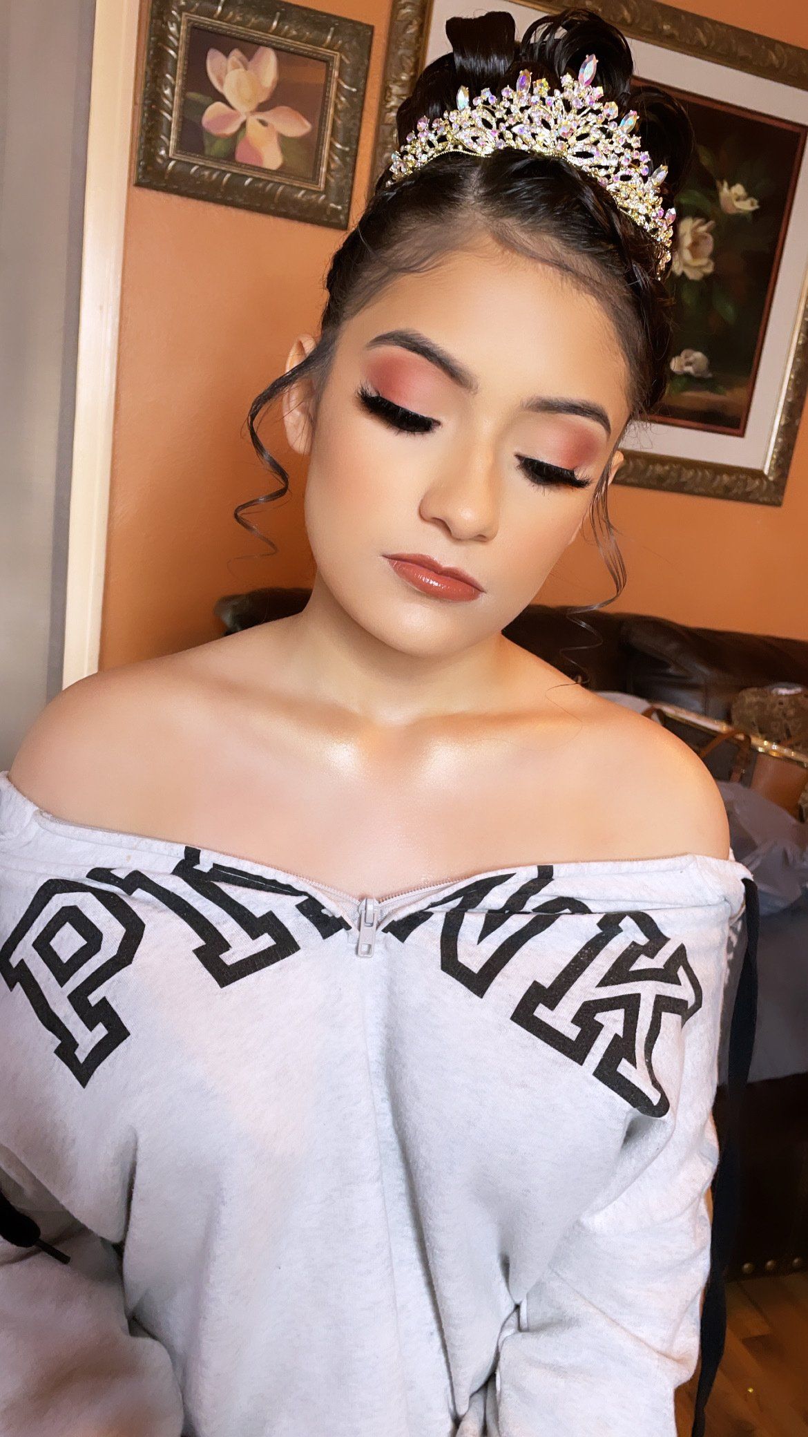 A woman after getting her hair and makeup done by a mobile stylist