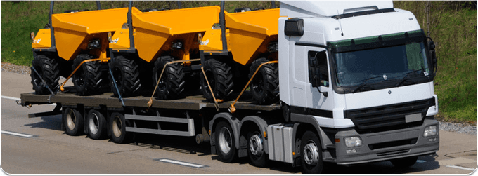 Articulated lorry with dumper trucks on it