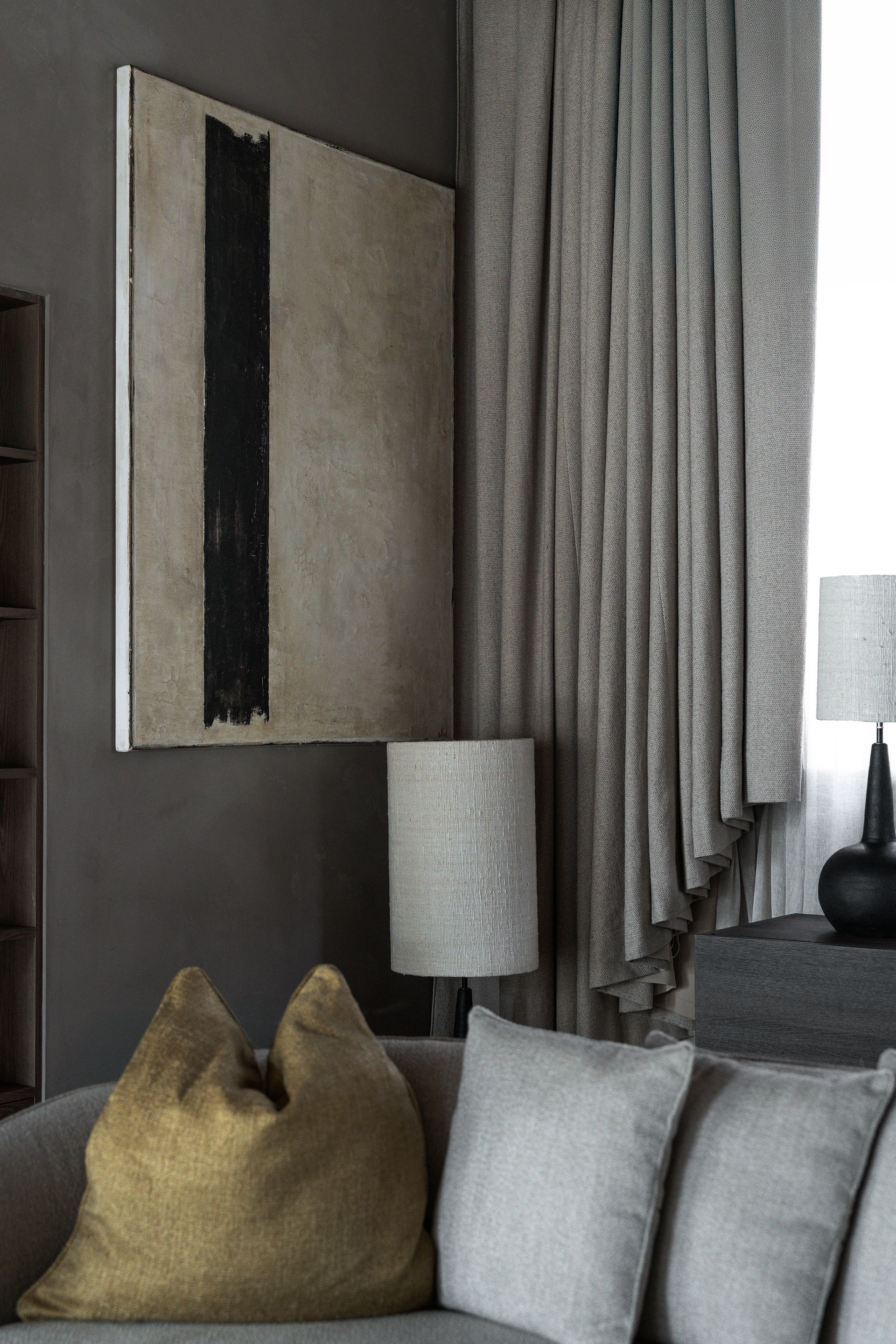 Chalet Escapade There is a painting on the wall above the couch in the living room.