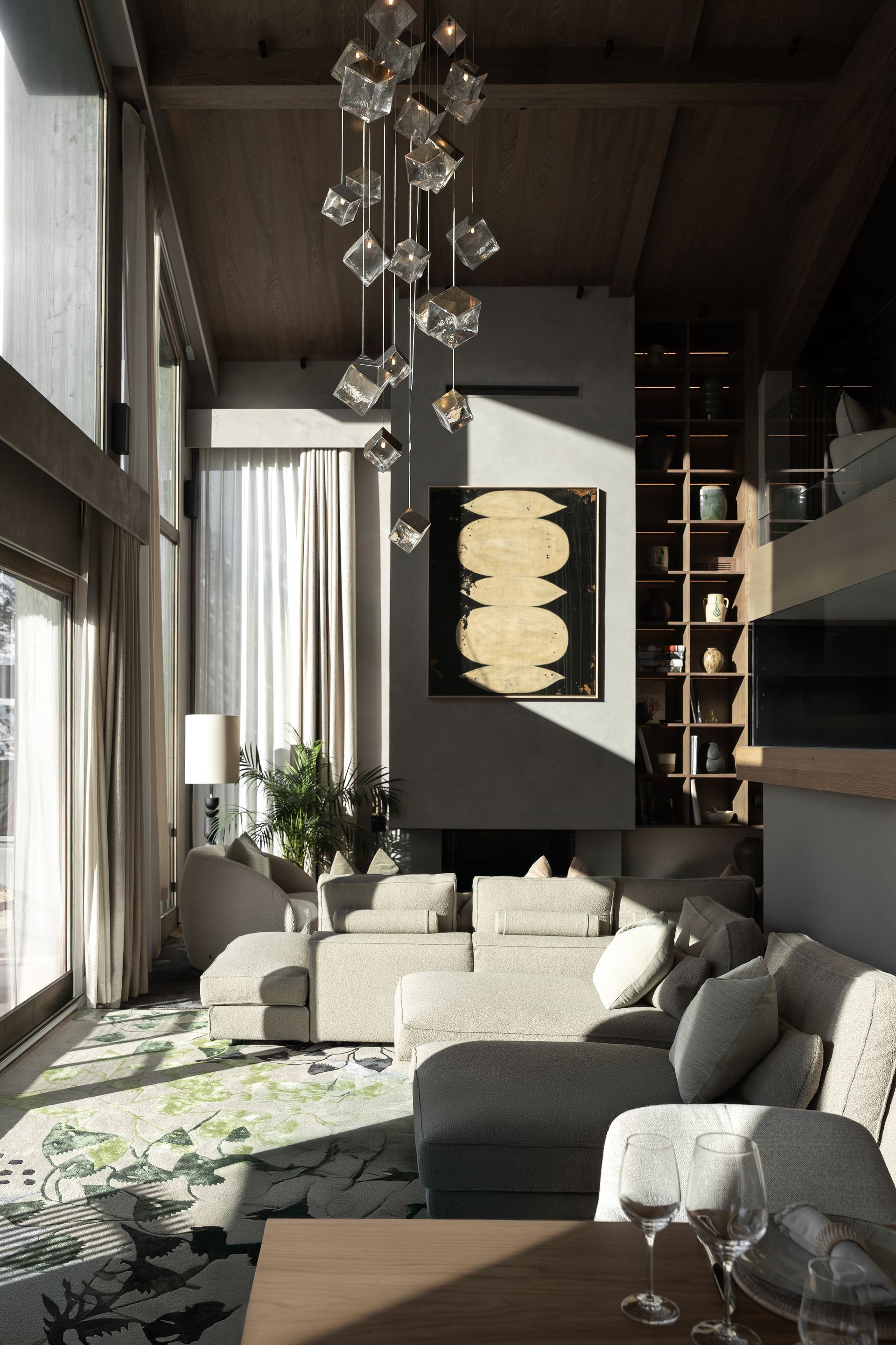 Chalet Escapade A living room with a couch and a fireplace