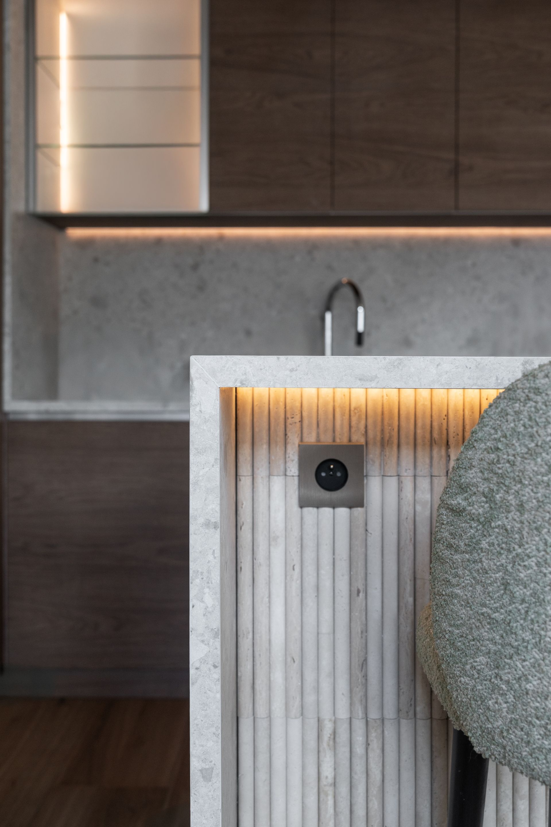 Chalet Escapade A kitchen with a sink and a light on the counter.