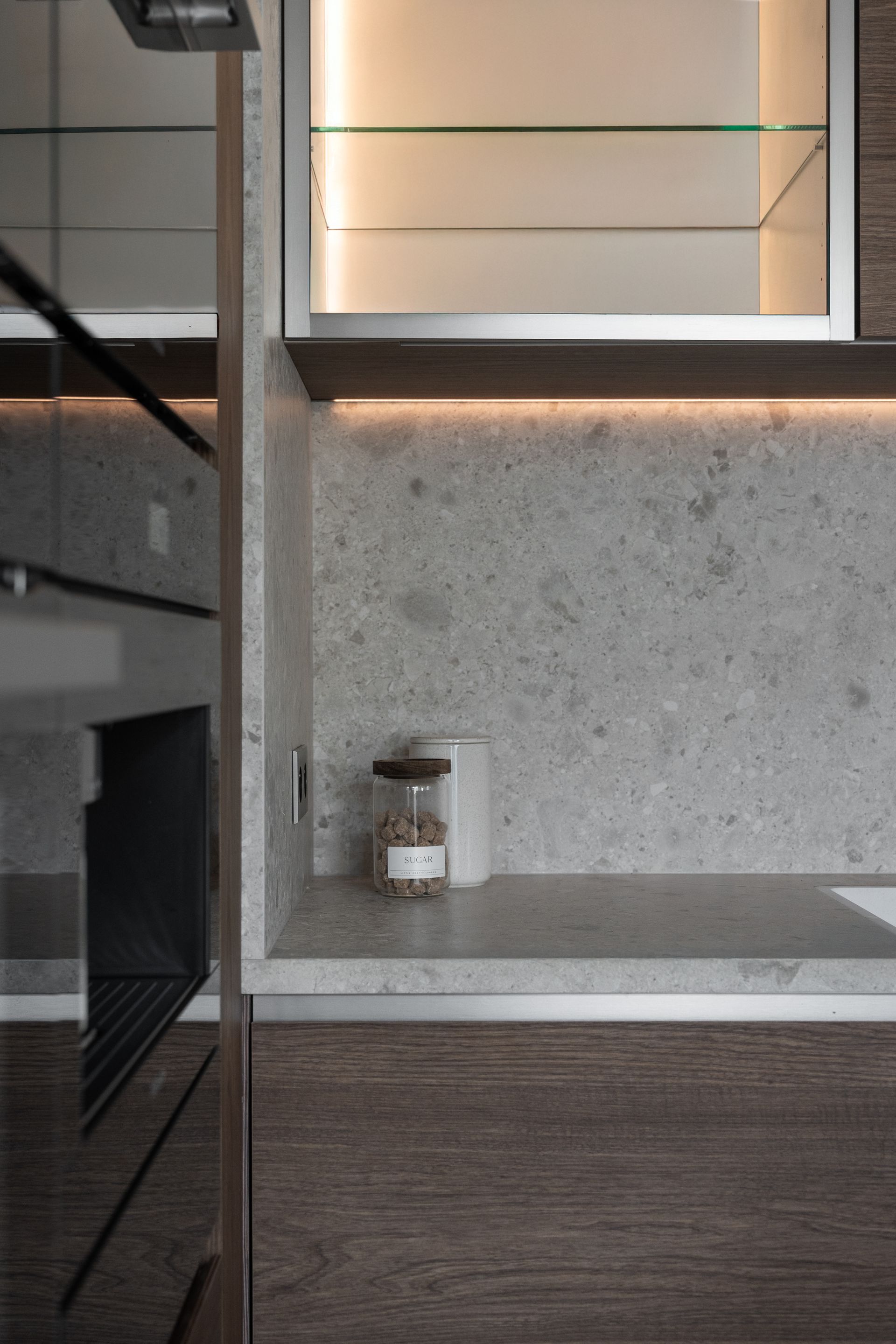 Chalet Escapade A kitchen counter with a jar of nuts on it.