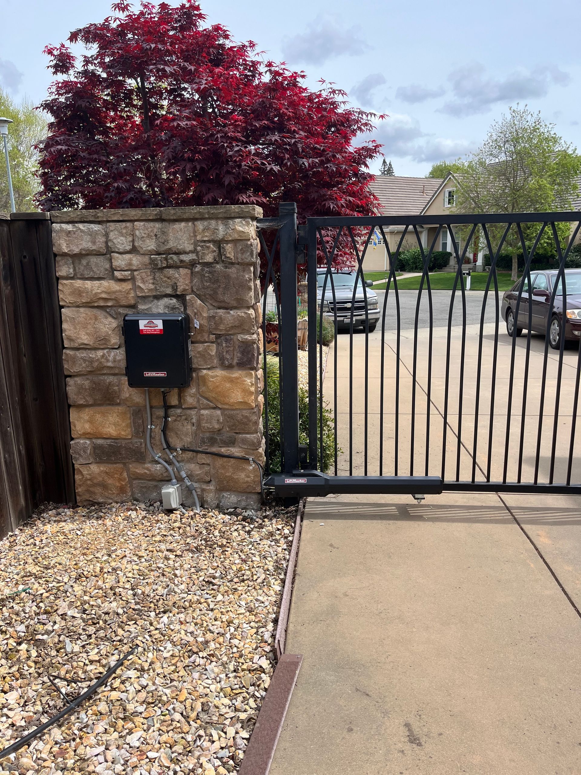 Custom driveway gate with automatic opener