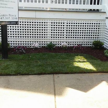 A yard with a sign that says karen pence on it