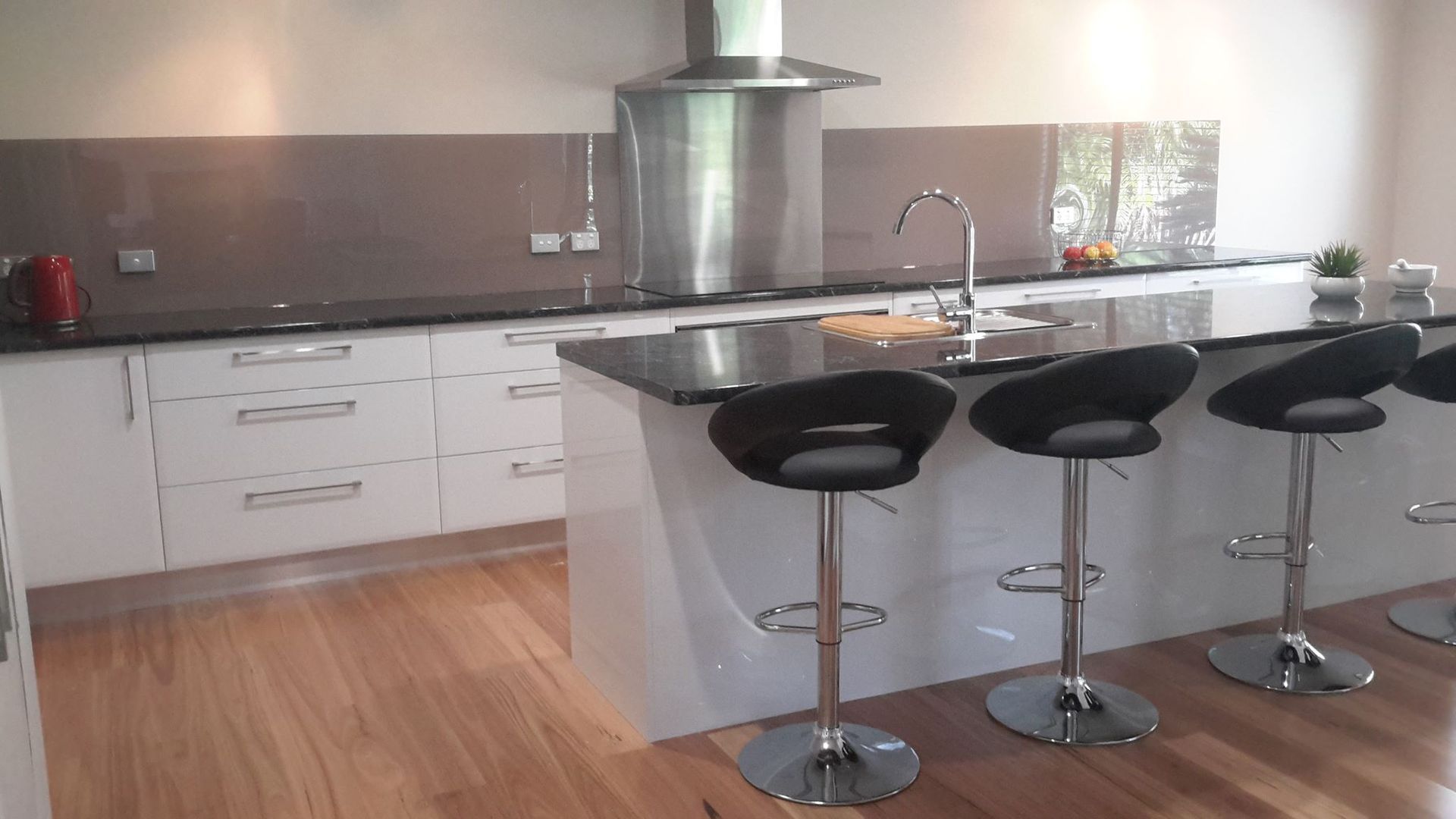 View Luxury Kitchen Island with Seating — Custom Cabinetry & Kitchen Renovations in Nambucca Heads, NSW