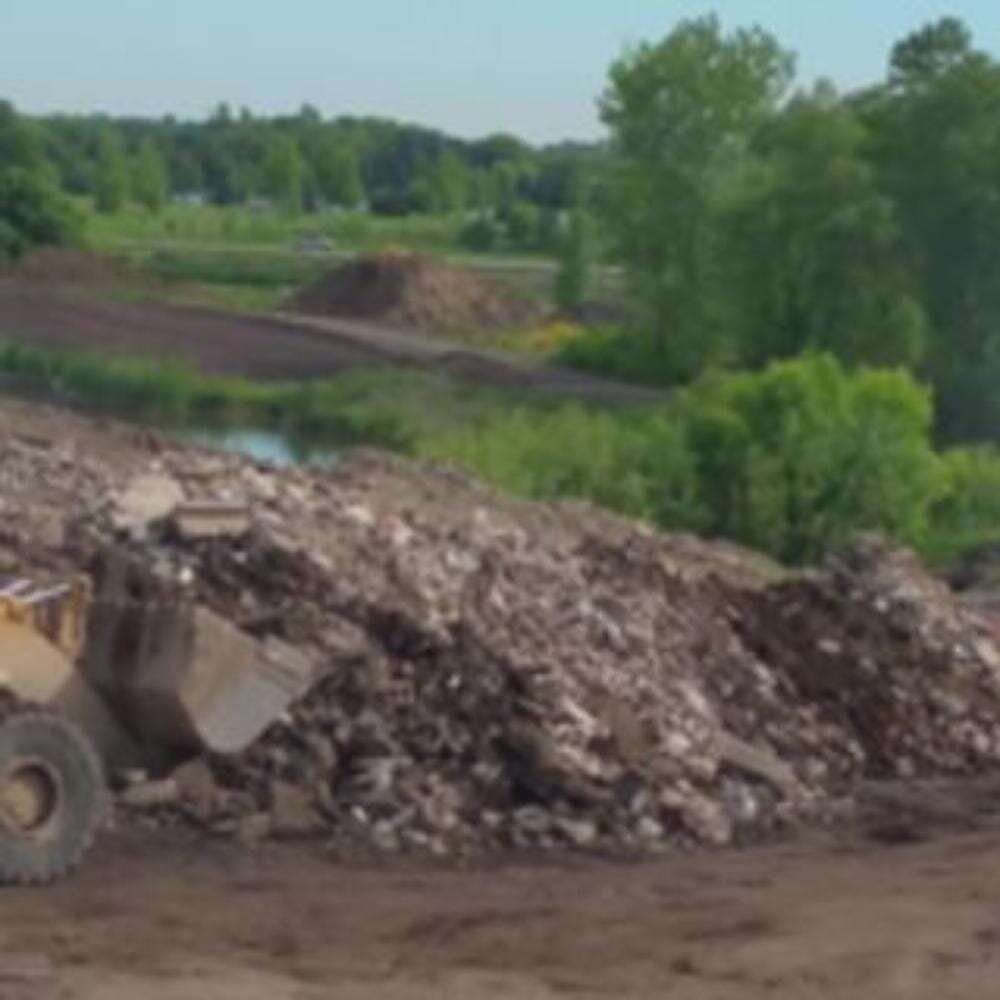 Tractor Piling The Rocks — Recycling Services in Medina, MN