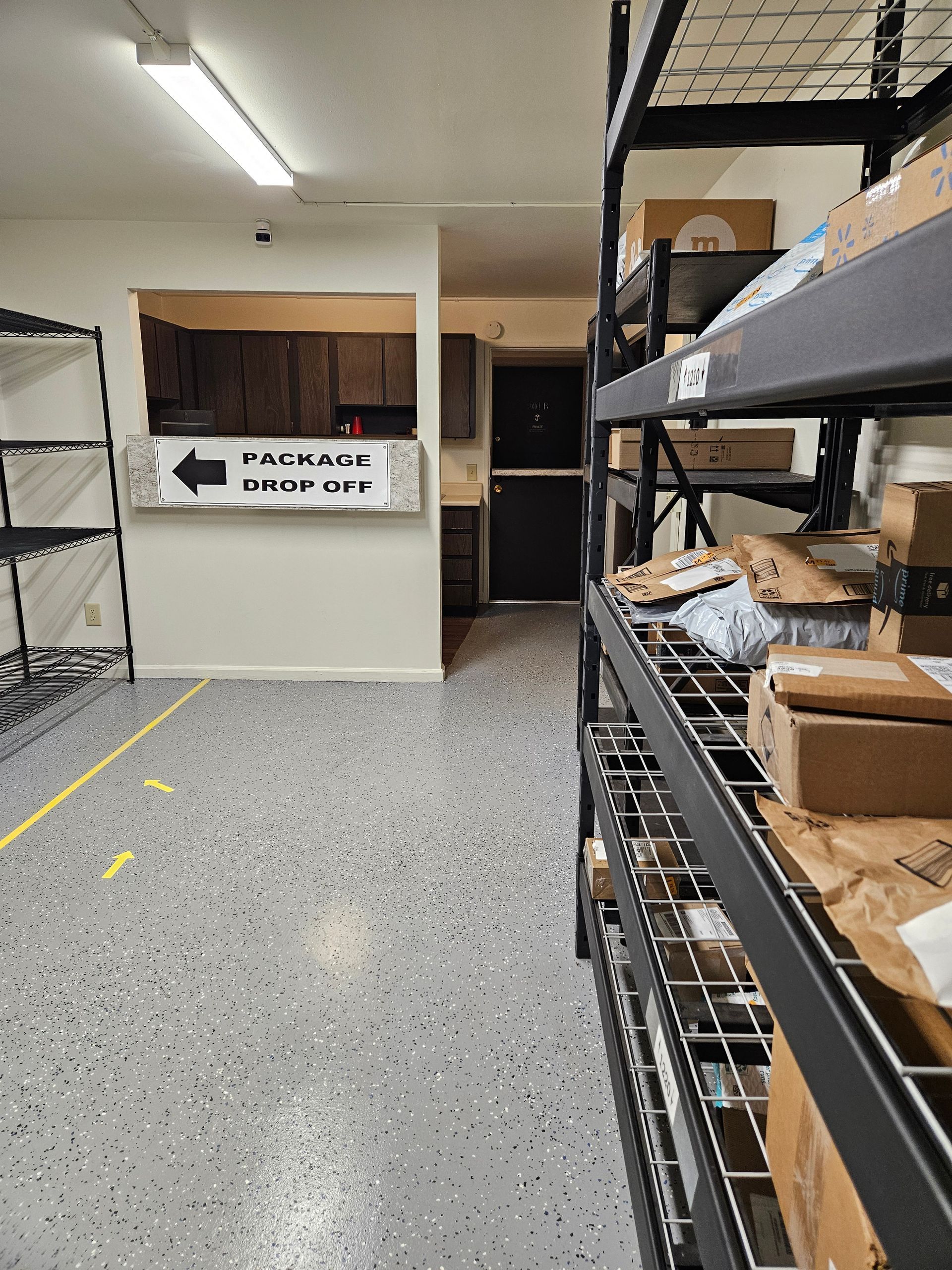 A warehouse with shelves filled with boxes and a sign that says package order off.