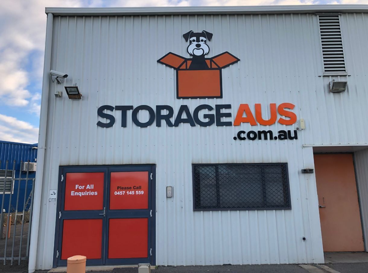 A White Building With the Storageaus Logo — Storage Aus In Cockburn, WA