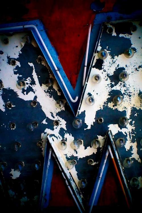 Close-up of weathered, illuminated 