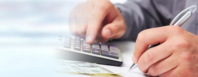 An Accountant Assessing Financial Records — SDM Accounting & Taxation Services In Cooroy, QLD