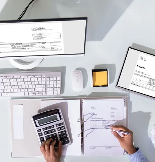 Small Business Accountant Calculates Figures With A Calculator — SDM Accounting & Taxation Services In Cooroy, QLD