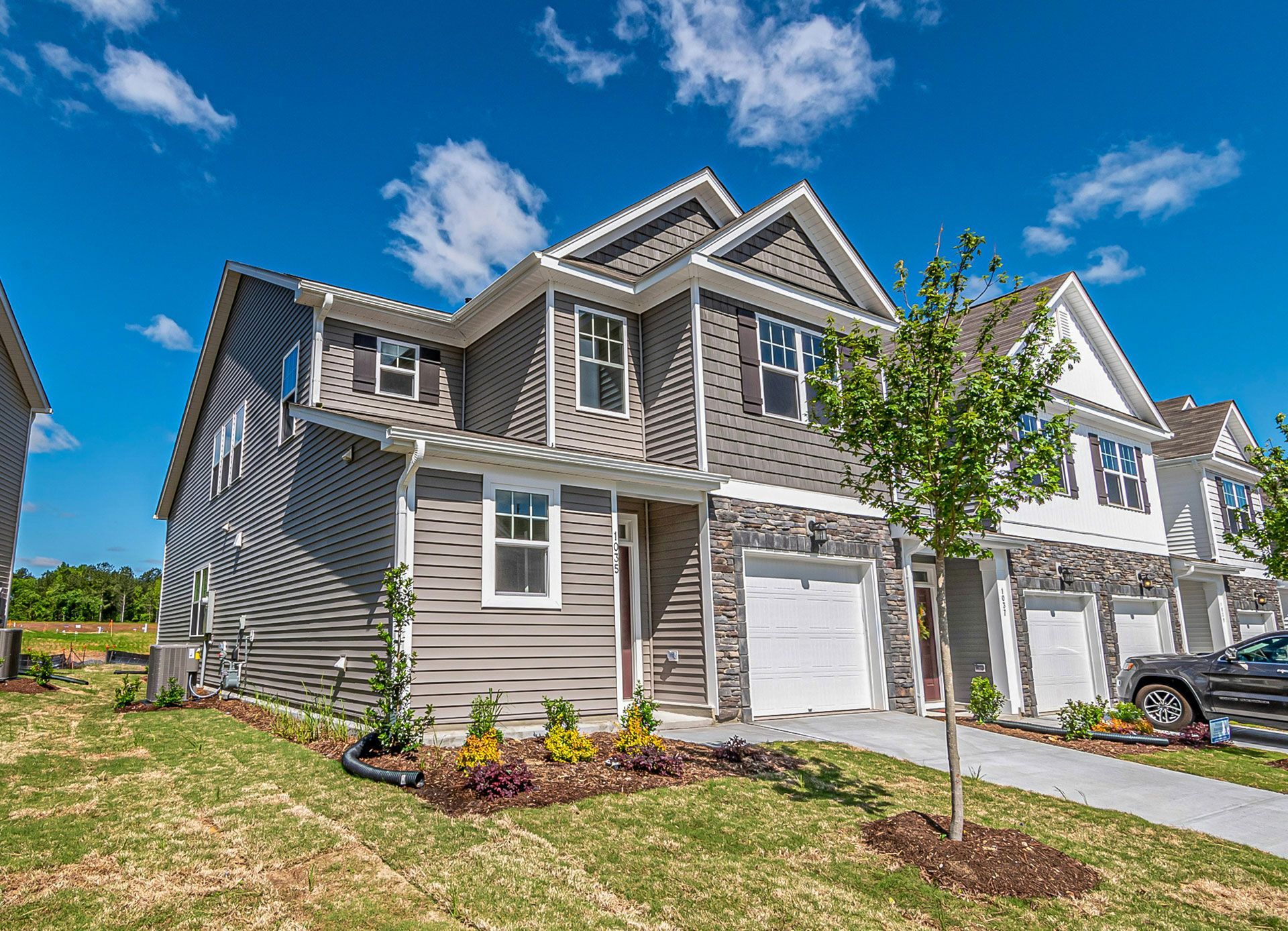 tan vinyl siding house