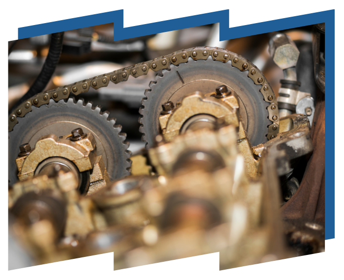 A close up of a machine with gears and chains