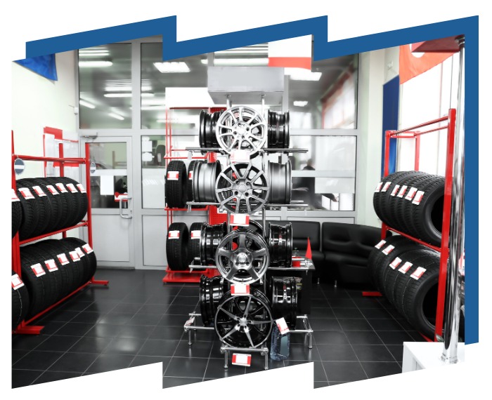 A display of tires and wheels in a store