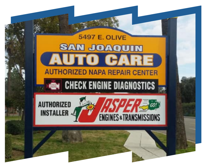 A sign that says san joaquin auto care on it