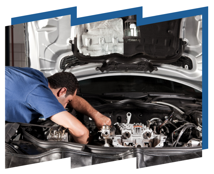 A man is working under the hood of a car.