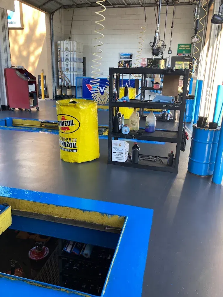 A garage with a yellow bag that says ' fuel ' on it