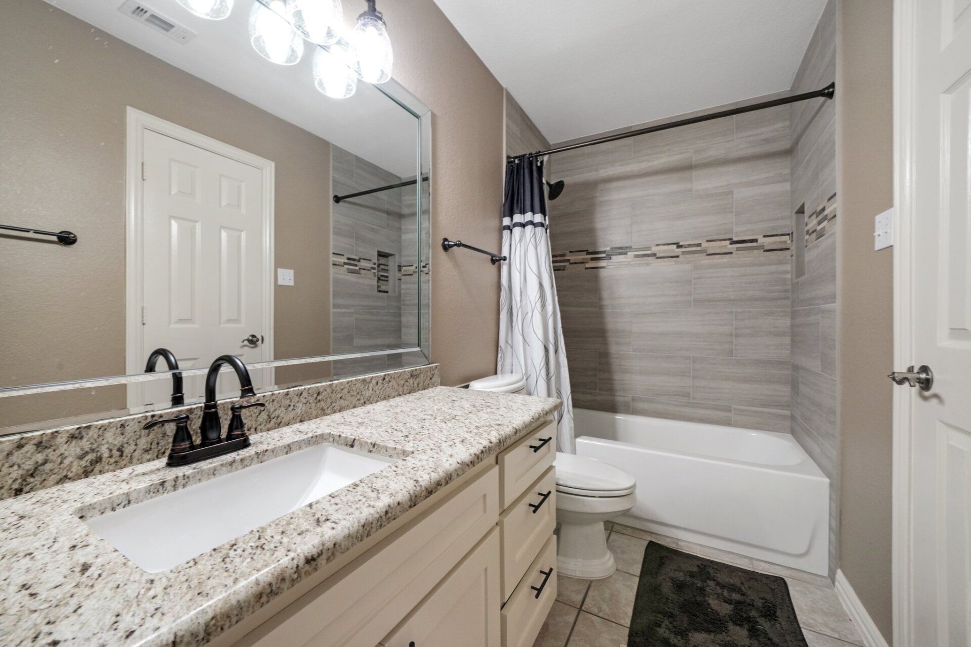 New tan bathroom renovation