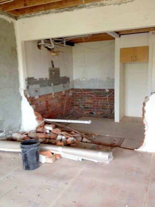 destroyed brick wall