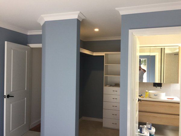 room with bluish grey walls