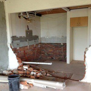 destroyed brick wall